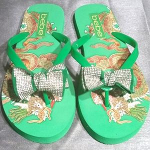 Bebe green thong flip flops